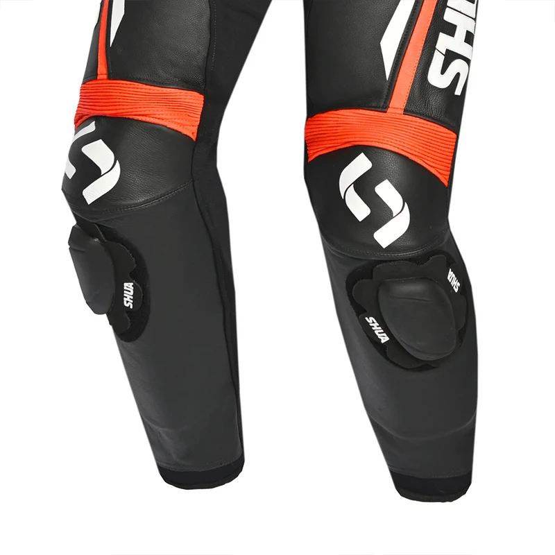 SHUA INFINITY 2PC MONO DE MOTO HOMBRE NEGRO NARANJA